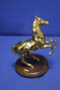 A BRASS FIGURE OF A HORSE