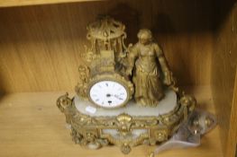 AN ONYX AND GILT CLOCK