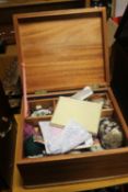 AN ANTIQUE SEWING BOX AND CONTENTS