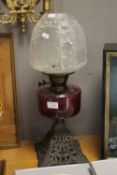 VICTORIAN CRANBERRY RESERVOIR OIL LAMP, WITH MOULDED AND ETCHED SHAPE