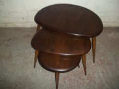 AN ERCOL PEBBLE NEST OF TABLES
