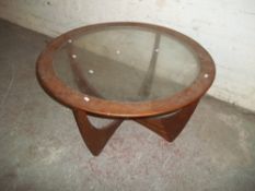 A RETRO TEAK AND GLASS COFFEE TABLE IN G PLAN STYLE