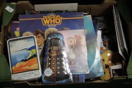 A TRAY OF DOCTOR WHO COLLECTABLES, to include trading cards, chocolates, a pair of gloves etc (