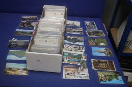 A BOX OF BRITISH POSTCARDS IN MANY HUNDREDS, to include St Ives, Torquay, Sussex, Bristol,