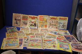 A QUANTITY OF COMICS to include 