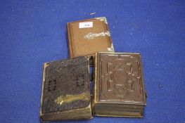 THREE VICTOTIAN LEATHER BOUND PHOTOGRAPH ALBUMS WITH CLASPS, containing Cartes De Visites Cabinet