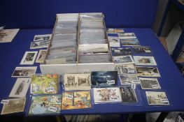 TWO TRAYS OF ASSORTED POSTCARDS IN MANY HUNDREDS, to include vintage examples from the early 1900s