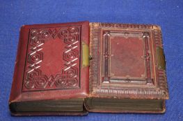 TWO LEATHER BOUND VICTORIAN ALBUMS CONTAINING CARTES DE VISITES, to include Price and Sons, R