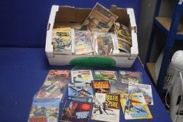 A COLLECTION OF BOOKS AND COMICS, to include Commando, battle etc