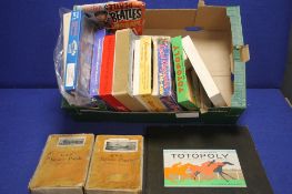 A TRAY CONTAINING A SELECTION OF JIGSAW PUZZLES, to include 2 vintage GWR examples together with a