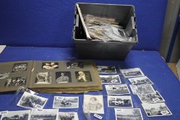 A BOX OF ASSORTED POSTCARDS, to include an album of postcards and photographs mainly cathedrals etc