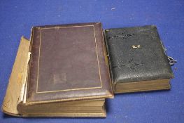 TWO VICTORIAN LEATHER BOUND PHOTO ALBUMS WITH CLASPS, containing a quantity of Cartes De Visites/