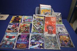 A TRAY OF MISCELLANEOUS COMICS, to include Impossible, First Strike, Wake the Dead, Cosmic