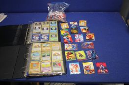 TWO ALBUMS OF POKEMON TRADING CARDS,together with a collection of Marvel trading cards