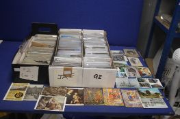 THREE TRAYS OF ASSORTED POSTCARDS IN MANY HUNDREDS, to include examples from the early 1900s