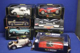 SEVEN BOXED 1.18 SCALE DIECAST CARS, to include Chevrolet Corvette, Alfa Romeo, Porche Coupe,