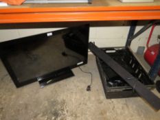 A FLATSCREEN TV - PS1, SOUND BAR ETC