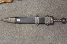 A MODERN COPY OF A GLADIUS SWORD IN METAL DECORATIVE SCABBARD