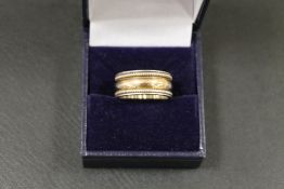 A 925 SILVER AND 18K BAND