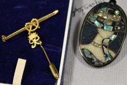 A GOLD PLATED STAFFORDSHIRE KNOT BROOCH TOGETHER WITH A STICK PIN AND A NEW ZEALAND PAUA SHELL
