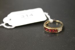 A GEMSET RING STAMPED 9K - APPROX WEIGHT 2.4 G