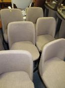 A SET OF EIGHT MODERN UPHOLSTERED DINING CHAIRS