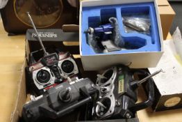 A MODEL AIRCRAFT ENGINE IN AN O.S. SURPASS BOX - UNCHECKED, TOGETHER WITH A SELECTION OF REMOTES ETC