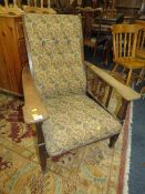 A VINTAGE OAK ARMCHAIR
