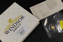 A 585 GOLD THREE KINGS COMMEMORATIVE COIN - APPROX WEIGHT 0.5 G