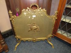 A LOUIS XV STYLE BRASS FIRESCREEN H-74 W-72 CM