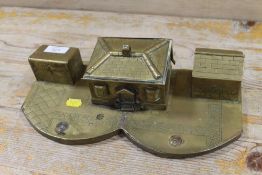 A VINTAGE BRASS TRENCH ART DESK TIDY