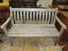 A HARDWOOD GARDEN BENCH