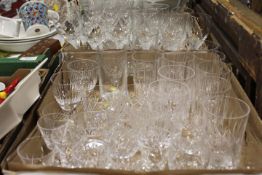 TWO TRAYS OF ASSORTED GLASSWARE MAINLY DRINKING GLASSES, TO INCLUDE CUT GLASS EXAMPLES, TWO VASES