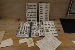 A TRAVELLING SALESMANS BUCKLE & PLATE KIT TOGETHER WITH ASSOCIATED PAPERWORK