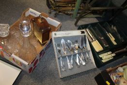 A TRAY OF ASSORTED DECANTERS AND A CLOCK TOGETHER WITH A SELECTION OF FLATWARE ETC