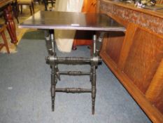 AN EDWARDIAN EBONISED AESTHETIC TABLE