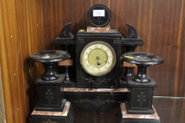 A VINTAGE BLACK SLATE AND MARBLE CLOCK GARNITURE