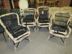A SET OF FOUR MODERN WICKER ARMCHAIRS WITH STOOLS