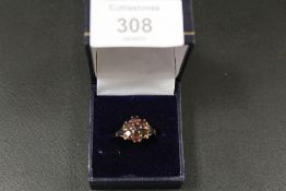 A HALLMARKED 9CT GOLD GARNET RING A/F - APPROX WEIGHT 3.5 G