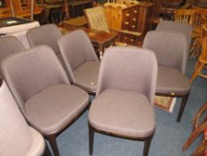 A SET OF SEVEN MODERN UPHOLSTERED DINING CHAIRS