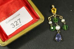 A GILT METAL PENDANT SET WITH SEED PEARLS AND COLOURED STONES