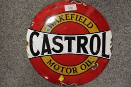 A VINTAGE STYLE ENAMEL CASTROL WAKEFIELD CIRCULAR SIGN
