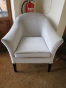 A SINGLE UPHOLSTERED CLUB STYLE CHAIR