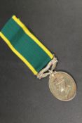 A GEORGE VI MEDAL AND RIBBON FOR EFFICIENT SERVICE TO 925514 BDR. K. W. GOLE. RA
