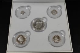 A CASED SET OF SIX SILVER COINS BY SILVER SOVEREIGN