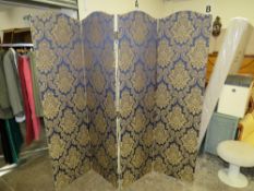 AN UPHOLSTERED FOUR FOLD DRESSING SCREEN