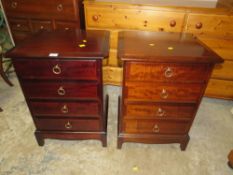 A PAIR OF STAG MINSTREL FOUR DRAWER BEDROOM CHESTS