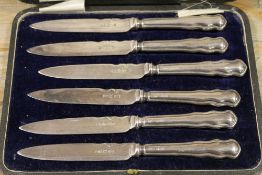 A CASED SET OF HALLMARKED SILVER HANDLED KNIVES