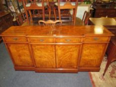 A QUALITY REPRODUCTION WALNUT BREAKFRONT SIDEBOARD WITH CROSSBANDED DETAILS, H 87 CM, W 182 CM
