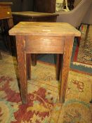 A RUSTIC STOOL